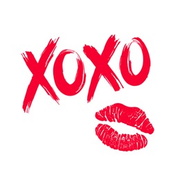 XOXO (hugs and kisses) brush lettering and lipstick kiss on a white background. Vector illustration