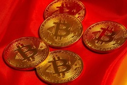 Close up of symbolic bitcoins