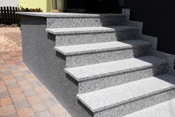 Staircase with solid block steps with stone chip render