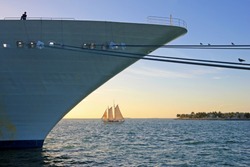 Big cruise ship and small sailing boat, size comparison, Key West, Florida the Sunshine State, USA