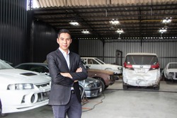 entrepreneur businessman small business owner, paint garage, car repair shop.