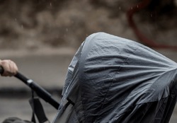 stroller cover used during rain in the city