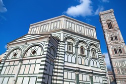 Baptistery of San Giovanni and Bell Tower in Florence. Italian Gothic style. Landmark of Tuscany.  June 2017.
