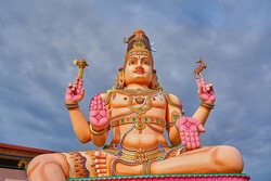 God's Shiva statue in the Hindu water at Trincomalee, Sri Lanka                             