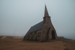Church on a Cliff. church in the morning mist. Old Abandoned Church in the Fog. 