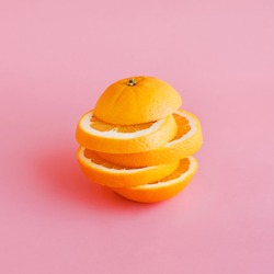 Orange slice on pastel color background.Summer and healthy concept idea