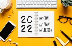 2022 new year goal,plan,action concepts with text on notepad and office accessories.Business management,Inspiration to success ideas