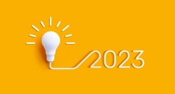 2023 Creativity and inspiration ideas with lightbulb on colorful background.Business solution or smart working concepts 