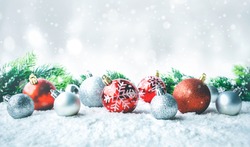 Christmas ball (ornament) on snow background.For christmas day concepts or new year,celebration ideas.copy space