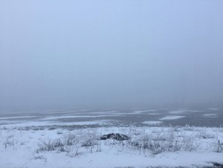 Large empty field, cold winter snow, fog in sky, isolated, abstract modern,