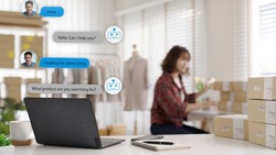 Chatbot conversation on laptop screen app interface with artificial intelligence technology providing virtual robotic assistant customer support and information for small business SME B2C concept.