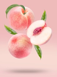 Fresh White Peach fruit with leaf isolated on Peach color background With clipping path,