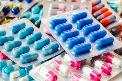 pharmaceuticals antibiotics pills medicine /colorful antibacterials pills on  white background /capsule pill medicine 