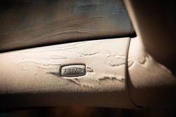 Airbag logo, emblem, label or title in a car.