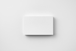Design concept - top view of horizontal business card isolated on white background for mockup, it's real photo, not 3D render