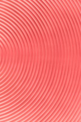 Design concept - abstract pink plastic concentric circle texture background, not 3d render