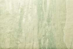 Abstract art background light green color. Multicolor painting on canvas. Fragment of artwork. Texture backdrop. Decorative olive wallpaper. Structure of paper.