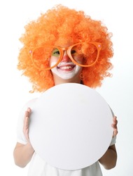 Portrait of happy funny clown kid holding circle copy space banner for your message