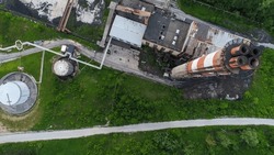 Aerial view of big factory chimney along
