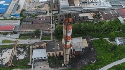 Aerial view of big factory chimney along