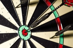playing darts hobby, leisure, friends, fun, sports and recreation