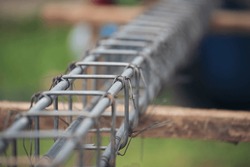 Iron rebar wire reinforcement of concrete work. Construction site objects of bending cutting steel wire fences bar. Civil construction engineering concept. pile of under-construction materials