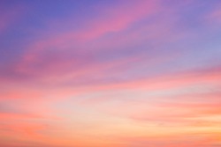 Dusk,Evening sky with colorful sunlight,Beautiful romantic sunset cloud on twilight,majestic peaceful nature background,pink and orange,purple sunlight on cloud fluffy summer season sky.