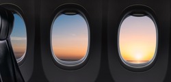 Windows and Seat Inside Airplane flying on sunset sky in the morning over ocean, Inside Plane Nobody