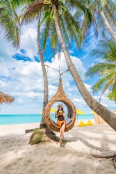 Summer lifestyle traveler woman relaxing on straw nests joy nature view landscape vacation luxury beach, Attraction place leisure tourist travel Thailand holiday, Tourism beautiful destination Asia