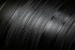 Surface of an old vinyl record. Macro shot, shallow depth of field.