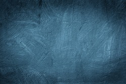 Grunge blue painted wall texture background.