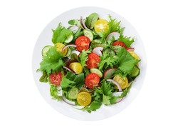 plate of salad with fresh vegetables isolated on white background, top view
