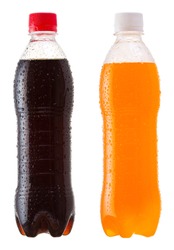 different bottles of soda on white background