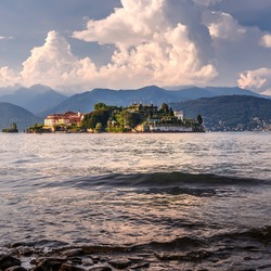 Wonderful Scenic view on beautiful Lake Maggiore among the mountains, Italy. Isola Bella. The island owes its fame to the Borromeo family who built a magnificent palace with a beautiful garden.