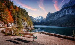 Amazing nature landscape. Wonderful Picturesque sunset over the Gossausee lake in Austrian Alps. Travel adventure concept. Concept of ideal resting place of outdoor. Picture of wild nature
