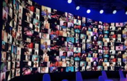 Blur large LED screen show many people's faces join big online event or virtual reality live conference. Big video call seminar, Work from home, Social distancing, New normal event production.