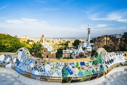 Barcelona, seen from Park Güell with colorful mosaics.