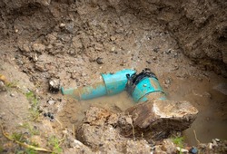 plumbing broken plastic pipe in the hole and water in wait repair