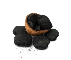 Coconut coal briquette isolated. Pressed charcoal for braai, coconut barbecue coal, bbq briquettes, grill charcoal on white background