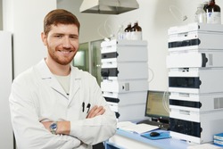 researcher man at scientific analysing work in chemistry laboratory
