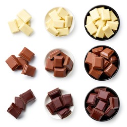 Set of dark, white and milk chocolate pieces isolated on white background, top view
