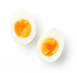 Soft boiled eggs isolated on white background, top view