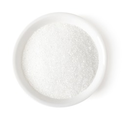 Bowl of white sugar isolated on white background, top view