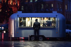 fast food trailer in night street