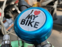 Bicycle steering wheel with bell and handles. Bicycle bell Bicycle bell 'I love my bike'