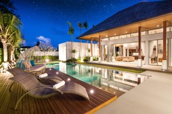 real estate Luxury Interior and exterior design  pool villa with living room  at  night sky  home, house ,sun bed ,sofa