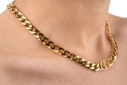 model in modern gold metal necklace chain. Necklace on woman's neck. women's gold pendant around the neck of a girl, women's jewelry, women's accessories, women's jewelry.