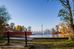 View of Toronto from center island with seasonal autumn trees