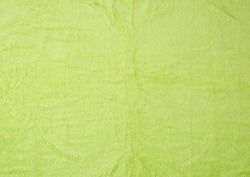 texture of fleecy bright green towels, full frame, close up