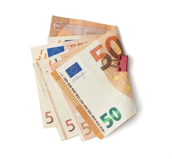 stacked stack of paper notes of the European Union, face value 50 euros, money isolated on a white background